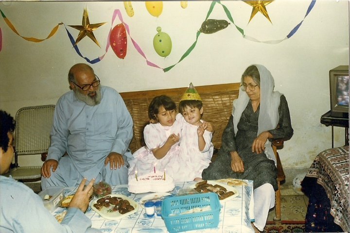 Hinna celebrating her birthday with her grandparents in Afghanistan.